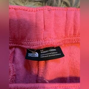 Women’s pink north face sweatpants